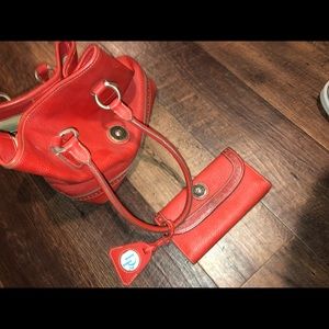 Dooney and Burke red purse with matching wallet